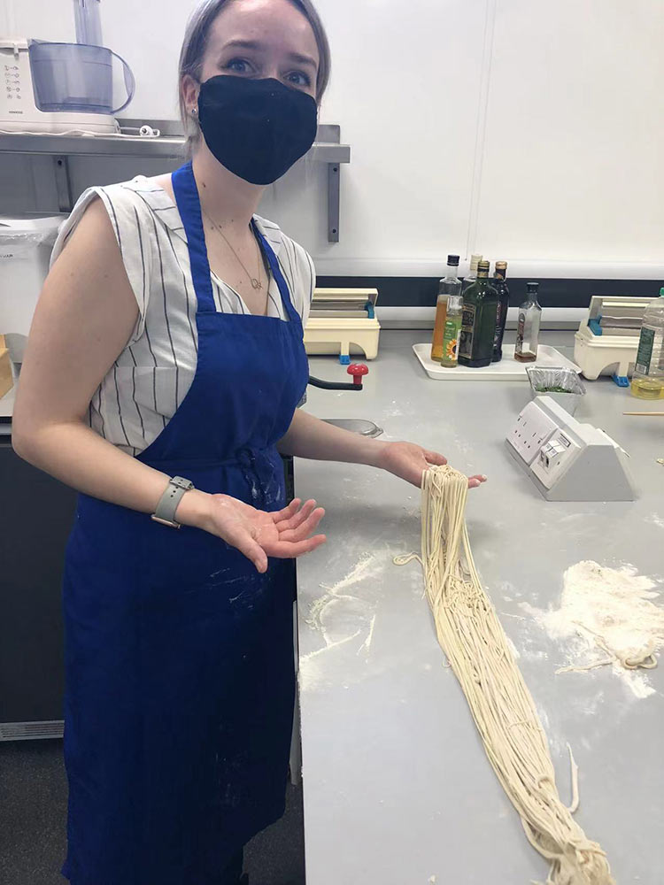 MMU student with the hand-pulled  noodle,  ready to cook 