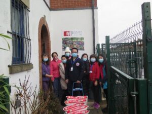 Volunteers delivery food to community across Great Manchester during the Chinese New Year - 2022